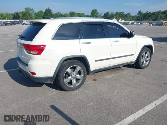 2011 Jeep Grand Cherokee Overland with VIN 1J4RR6GT2BC631909, listed as a IAAI auction lot 42564356 with 205,954 mi miles and . Bid and sale history available at DreamBid. Image 4.