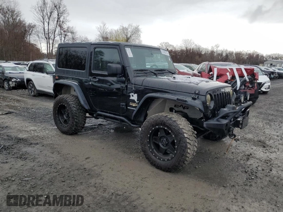2014 Jeep Wrangler Sahara with VIN 1C4AJWBG0EL306703, listed as a Copart auction lot 51450215 with 115,932 mi miles and Salvage Title. Bid and sale history available at DreamBid. Image 4.