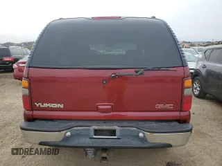2001 GMC Yukon SLT z VIN 1GKEC13T21J302687, wystawiony jako Copart lot #80982344 z przebiegiem 139 565 mil mil oraz Szkoda całkowita • Salvage title. Historia ofert i sprzedaży dostępna na DreamBid. Obrazek 6.