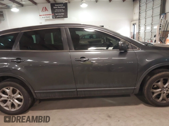 2014 Mazda CX-9 Sport with VIN JM3TB3BV3E0434817, listed as a IAAI auction lot 41394036 with 157,304 mi miles. Bid and sale history available at carsss.com. Image 13.