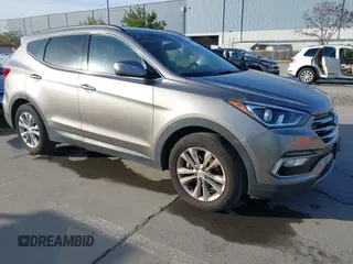 2017 Hyundai Santa Fe Sport 2.0T with VIN 5XYZU4LA7HG406516, listed as a IAAI auction lot 41847977 with 105,299 mi miles. Bid and sale history available at carsss.com. Image 1.