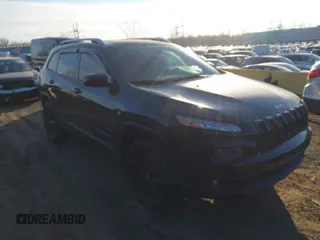 2015 Jeep Cherokee Latitude with VIN 1C4PJMCS0FW745949, listed as a IAAI auction lot 41289847 with 137,440 mi miles and . Bid and sale history available at carsss.com. Image 1.