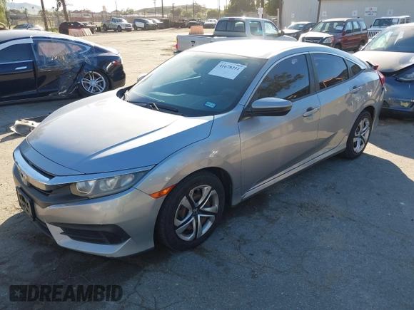 2016 Honda Civic Sedan LX with VIN 19XFC2F50GE027409, listed as a IAAI auction lot 41678211 with 116,498 mi miles. Bid and sale history available at carsss.com. Image 19.