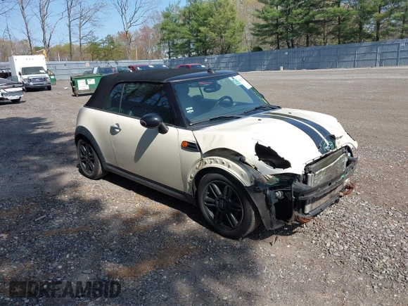 2013 MINI Convertible with VIN WMWZN3C58DT135598, listed as a IAAI auction lot 42122817 with 120,638 mi miles and . Bid and sale history available at DreamBid. Image 1.
