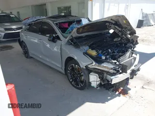 2024 Kia K5 GT-Line z VIN 5XXG64J28RG230692, wystawiony jako IAAI lot #42239298 z przebiegiem 27 541 mil mil oraz . Historia ofert i sprzedaży dostępna na DreamBid. Obrazek 1.