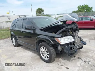 2015 Dodge Journey SXT with VIN 3C4PDCBB3FT577121, listed as a IAAI auction lot 41855712 with Not Provided miles and . Bid and sale history available at DreamBid. Image 1.