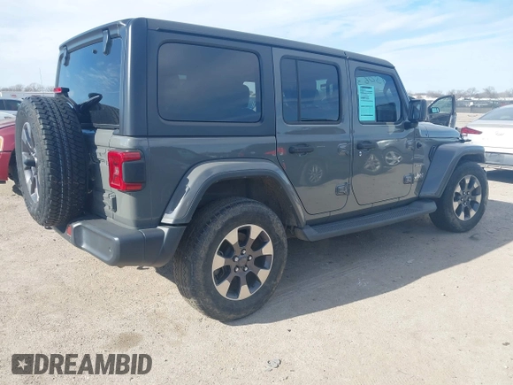 2018 Jeep Wrangler Unlimited Sahara z VIN 1C4HJXEN9JW215890, wystawiony jako IAAI lot #41215063 z przebiegiem 39 567 mil mil oraz . Historia ofert i sprzedaży dostępna na DreamBid. Obrazek 4.