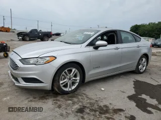 2018 Ford Fusion SE z VIN 3FA6P0LU3JR131449, wystawiony jako Copart lot #60751185 z przebiegiem 121 254 mil mil oraz Czysty tytuł • Clean title. Historia ofert i sprzedaży dostępna na DreamBid. Obrazek 1.