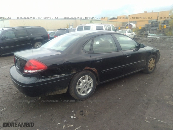2006 Ford Taurus SE with VIN 1FAFP53U46A224012, listed as a IAAI auction lot 26269236 with 141,185 mi miles. Bid and sale history available at carsss.com. Image 4.