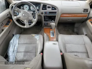 2003 Nissan Pathfinder LE z VIN JN8DR09Y63W835297, wystawiony jako Copart lot #76980904 z przebiegiem 254 778 mil mil oraz Szkoda całkowita • Salvage title. Historia ofert i sprzedaży dostępna na DreamBid. Obrazek 8.