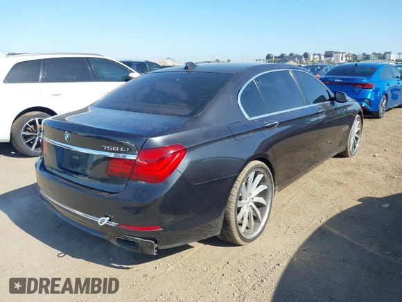 2013 BMW 7 Series 750Li xDrive z VIN WBAYF8C58DD141658, wystawiony jako IAAI lot #42327776 z przebiegiem 130 428 mil mil oraz . Historia ofert i sprzedaży dostępna na DreamBid. Obrazek 4.