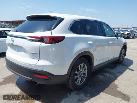 2019 Mazda CX-9 Touring z VIN JM3TCBCY2K0300702, wystawiony jako IAAI lot #42194050 z przebiegiem 98 247 mil mil oraz . Historia ofert i sprzedaży dostępna na DreamBid. Obrazek 4.