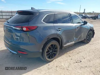 2022 Mazda CX-9 Grand Touring with VIN JM3TCBDY6N0613996, listed as a IAAI auction lot 41018105 with 58,110 mi miles. Bid and sale history available at carsss.com. Image 4.
