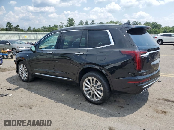 2023 Cadillac XT6 AWD Premium Luxury z VIN 1GYKPFRS7PZ225950, wystawiony jako Copart lot #65573174 z przebiegiem Nie podano mil oraz Szkoda całkowita • Salvage title. Historia ofert i sprzedaży dostępna na DreamBid. Obrazek 2.