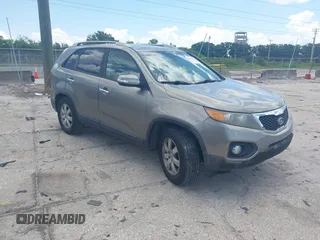 2013 Kia Sorento LX with VIN 5XYKT3A62DG322174, listed as a IAAI auction lot 42647736 with 92,389 mi miles and . Bid and sale history available at DreamBid. Image 1.