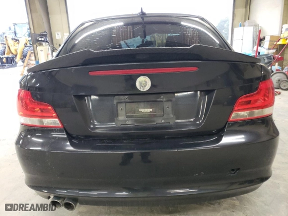2012 BMW 1 Series 128i with VIN WBAUP7C59CVP22603, listed as a Copart auction lot 70217864 with 0 mi miles and Salvage Title. Bid and sale history available at carsss.com. Image 6.