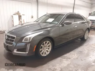 2014 Cadillac CTS Luxury AWD with VIN 1G6AX5S37E0172041, listed as a IAAI auction lot 40343343 with 102,506 mi miles and . Bid and sale history available at DreamBid. Image 2.