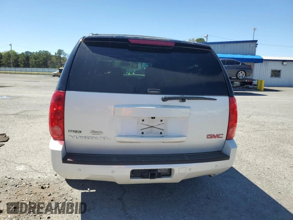 2011 GMC Yukon XL SLT z VIN 1GKS1KE06BR101797, wystawiony jako Copart lot #49614295 z przebiegiem 297 242 mil mil oraz Szkoda całkowita • Salvage title. Historia ofert i sprzedaży dostępna na DreamBid. Obrazek 6.