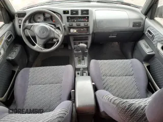 1999 Toyota RAV4 with VIN JT3GP10V4X7043368, listed as a Copart auction lot 74942864 with 367,714 mi miles and Salvage Title. Bid and sale history available at DreamBid. Image 8.