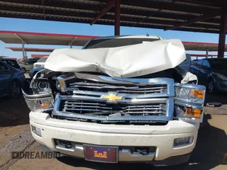 2014 Chevrolet Silverado 1500 High Country with VIN 3GCUKTEC2EG269961, listed as a IAAI auction lot 42054082 with 165,209 mi miles and . Bid and sale history available at DreamBid. Image 12.