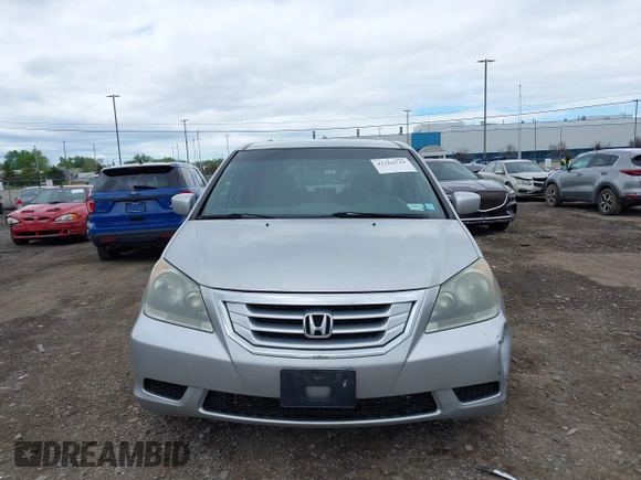 2010 Honda Odyssey EX z VIN 5FNRL3H44AB101312, wystawiony jako IAAI lot #42264744 z przebiegiem 173 917 mil mil oraz . Historia ofert i sprzedaży dostępna na DreamBid. Obrazek 13.