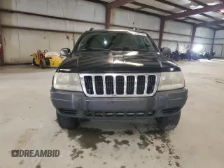 2003 Jeep Grand Cherokee Laredo with VIN 1J4GX48S13C601387, listed as a Copart auction lot 60544295 with 217,485 mi miles and Salvage title. Bid and sale history available at DreamBid. Image 5.