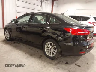 2018 Ford Focus SE with VIN 1FADP3F23JL215479, listed as a IAAI auction lot 41936036 with 96,560 mi miles. Bid and sale history available at carsss.com. Image 3.