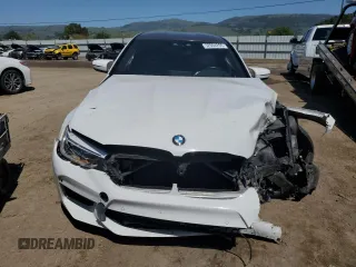 2019 BMW M5 z VIN WBSJF0C56KB446714, wystawiony jako Copart lot #52604265 z przebiegiem 63 401 mil mil oraz Szkoda całkowita • Salvage title. Historia ofert i sprzedaży dostępna na DreamBid. Obrazek 5.