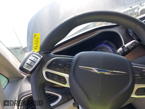 2017 Chrysler Pacifica Touring with VIN 2C4RC1DG1HR571607, listed as a IAAI auction lot 42454025 with 130,601 mi miles and . Bid and sale history available at DreamBid. Image 11.