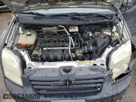 2010 Ford Transit Connect XLT z VIN NM0KS9BN5AT032732, wystawiony jako Copart lot #53851165 z przebiegiem 229 512 mil mil oraz Szkoda całkowita • Salvage title. Historia ofert i sprzedaży dostępna na DreamBid. Obrazek 12.