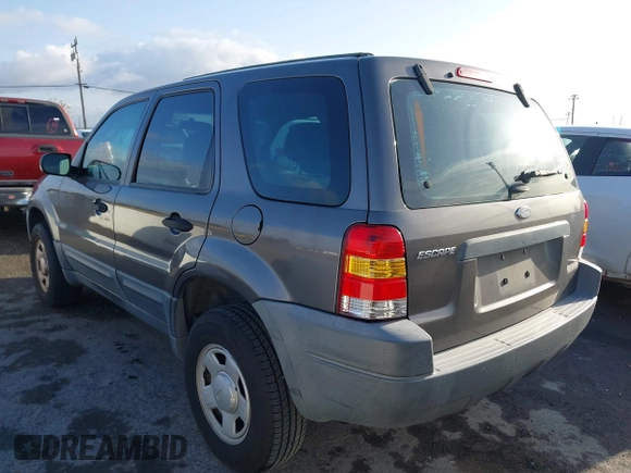 2004 Ford Escape with VIN 1FMCU02174KA61956, listed as a IAAI auction lot 41913605 with 166,587 mi miles and . Bid and sale history available at DreamBid. Image 3.