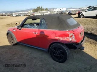 2014 MINI Convertible S with VIN WMWZP3C54ET298129, listed as a Copart auction lot 88523065 with 54,788 mi miles and Salvage title. Bid and sale history available at DreamBid. Image 2.
