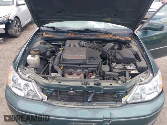 2001 Toyota Avalon XL z VIN 4T1BF28B11U168387, wystawiony jako IAAI lot #42186182 z przebiegiem 129 935 mil mil oraz . Historia ofert i sprzedaży dostępna na DreamBid. Obrazek 10.
