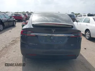 2018 Tesla Model X 75D with VIN 5YJXCDE21JF139712, listed as a IAAI auction lot 41905326 with Not Provided miles and . Bid and sale history available at carsss.com. Image 16.