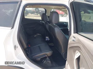 2015 Ford Escape Titanium with VIN 1FMCU0JX4FUB07322, listed as a IAAI auction lot 42220345 with 184,852 mi miles and . Bid and sale history available at DreamBid. Image 8.