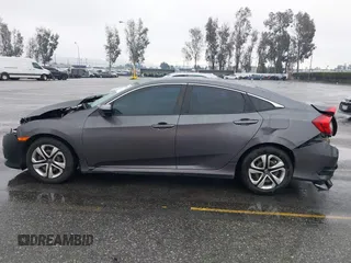 2017 Honda Civic Sedan LX with VIN 19XFC2F68HE212205, listed as a IAAI auction lot 41527843 with 128,401 mi miles. Bid and sale history available at carsss.com. Image 14.