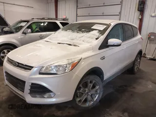 2013 Ford Escape SEL with VIN 1FMCU9HX0DUD85206, listed as a IAAI auction lot 41623110 with 99,223 mi miles. Bid and sale history available at carsss.com. Image 2.
