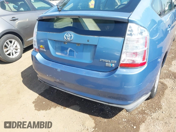 2006 Toyota Prius z VIN JTDKB20U063175034, wystawiony jako IAAI lot #42339383 z przebiegiem Nie podano mil oraz . Historia ofert i sprzedaży dostępna na DreamBid. Obrazek 6.