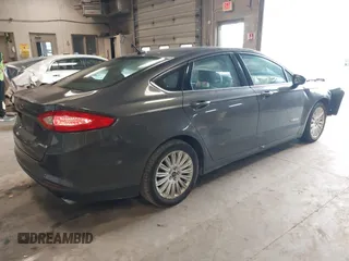 2015 Ford Fusion S Hybrid with VIN 3FA6P0UU8FR178675, listed as a IAAI auction lot 42104712 with 129,998 mi miles. Bid and sale history available at carsss.com. Image 4.