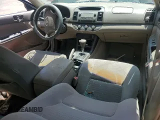2005 Toyota Camry STD z VIN 4T1BE32K85U429361, wystawiony jako Copart lot #59214715 z przebiegiem 284 988 mil mil oraz Nie do naprawy • Non repairable. Historia ofert i sprzedaży dostępna na DreamBid. Obrazek 8.