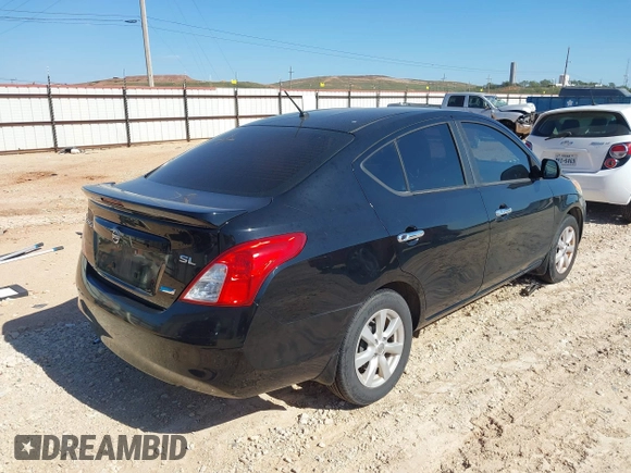 2013 Nissan Versa S with VIN 3N1CN7AP0DL851665, listed as a IAAI auction lot 40458221 with 149,889 mi miles and . Bid and sale history available at DreamBid. Image 4.