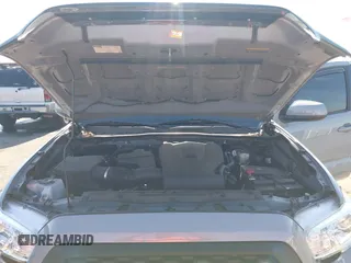2021 Toyota Tacoma SR5 with VIN 5TFAZ5CN7MX101810, listed as a IAAI auction lot 42454418 with 58,930 mi miles and . Bid and sale history available at DreamBid. Image 10.