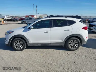 2016 Hyundai Tucson SE with VIN KM8J3CA42GU092788, listed as a IAAI auction lot 41297860 with 98,380 mi miles. Bid and sale history available at carsss.com. Image 14.