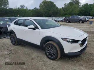 2021 Mazda CX-30 S with VIN 3MVDMBAL4MM219507, listed as a Copart auction lot 55579865 with 53,707 mi miles and Salvage title. Bid and sale history available at DreamBid. Image 4.
