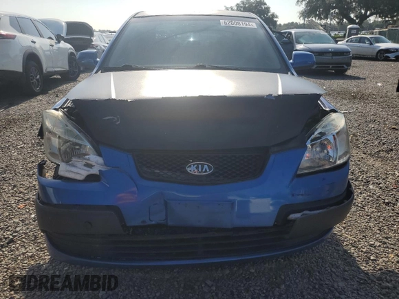 2009 Kia Rio LX with VIN KNADE223296515613, listed as a Copart auction lot 62008194 with 143,238 mi miles and Salvage Title. Bid and sale history available at carsss.com. Image 5.