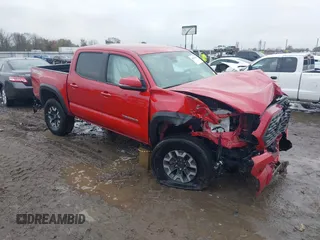 2021 Toyota Tacoma SR z VIN 5TFCZ5AN5MX260305, wystawiony jako IAAI lot #40876120 z przebiegiem 63 871 mil mil oraz . Historia ofert i sprzedaży dostępna na DreamBid. Obrazek 1.