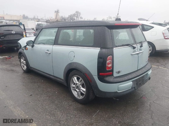 2013 MINI Cooper Clubman with VIN WMWZF3C56DT491108, listed as a IAAI auction lot 41734006 with 100,086 mi miles. Bid and sale history available at carsss.com. Image 3.