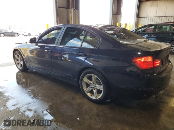 2014 BMW 3 Series 320i with VIN WBA3B1G5XENT00747, listed as a Copart auction lot 64737935 with 123,374 mi miles and Salvage title. Bid and sale history available at DreamBid. Image 2.