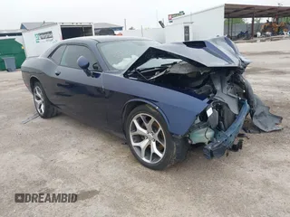 2016 Dodge Challenger SXT Plus z VIN 2C3CDZAG9GH354093, wystawiony jako IAAI lot #42107861 z przebiegiem 131 427 mil mil oraz . Historia ofert i sprzedaży dostępna na DreamBid. Obrazek 1.