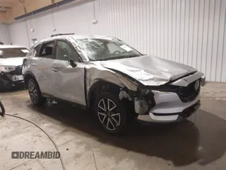 2018 Mazda CX-5 Touring with VIN JM3KFBCM7J0347769, listed as a IAAI auction lot 41611985 with 158,579 mi miles. Bid and sale history available at carsss.com. Image 1.